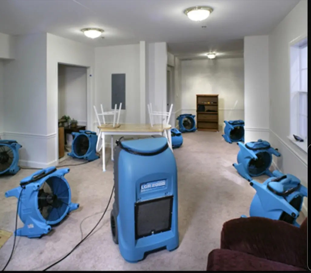 Air movers and dehumidifier setup for Water Extraction & Removal in DeKalb